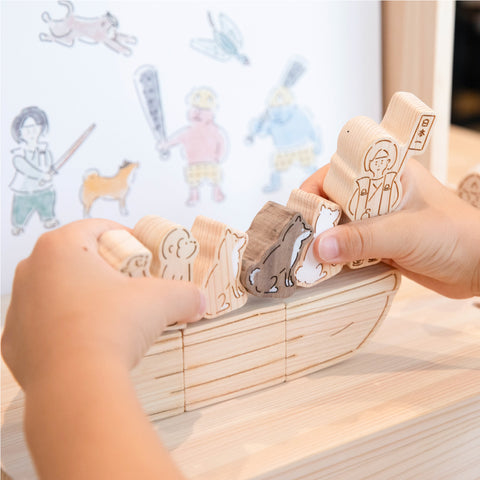 Momotaro, a small picture book theater in the forest 